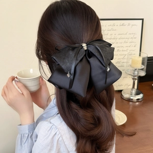 Elegant large black satin bow hair claw with sparkling rhinestones and delicate pendants
