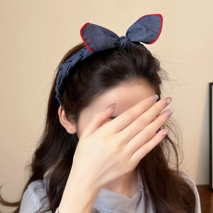 Blue denim rabbit ear headband with red stitching for stylish women hair styling
