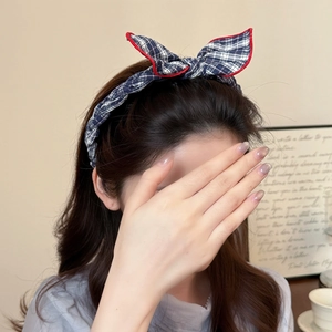 Polka dot plaid rabbit ear headband with blue white check pattern and red trim