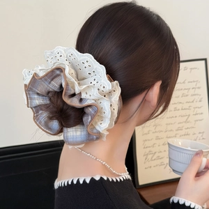 Lace layered scrunchie hair tie with blue checkered fabric for elegant ponytail styling