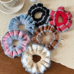 Set of 6 handmade knitted wool scrunchies in various chic colors for autumn and winter