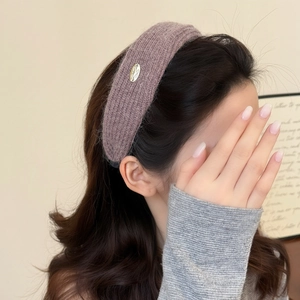 Knitted wide headband for women in dusty pink with a stylish gold metal buckle detail