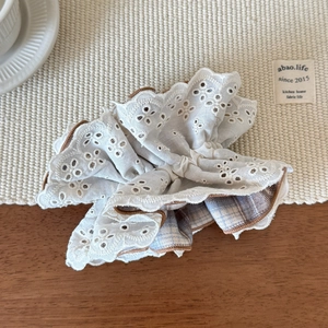 Chic white lace layered scrunchie with blue plaid lining and brown embroidery edge