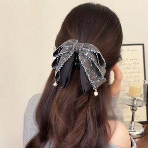 Elegant grey tweed bow hair claw with pearl pendants for women's half-up hairstyles