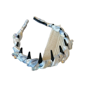 Blue tie-dye satin headband with black punk spikes and crystal accents for women