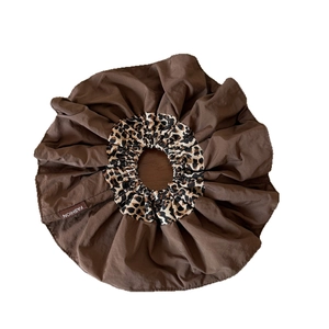 Brown pleated leopard print scrunchie hair tie with fashion label on white background
