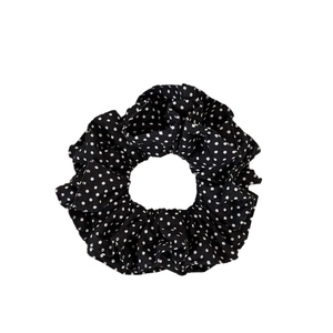 French style black and white polka dot fabric scrunchie with ruffled flower bud design