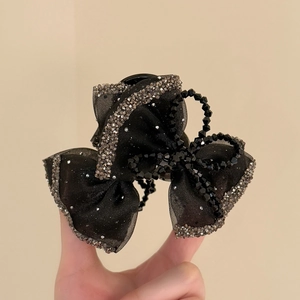 Elegant black mesh bow hair claw clip with silver rhinestones and beaded detail