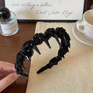 Gothic style black mesh headband with faceted crystals and sharp spikes decoration