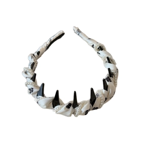 Elegant wide pearl headband with black camellia fabric and shark tooth design for women