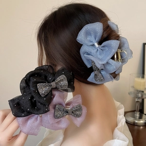 Elegant large mesh bow hair claw clips in blue, black, and purple with crystal butterfly