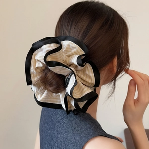Minimalist striped large scrunchie in beige and brown check pattern with black borders