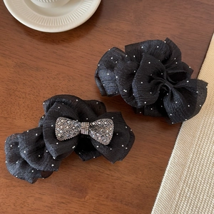Elegant black mesh bow hair claw clips with white polka dots and rhinestone accents