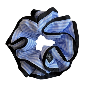 Blue and white striped large scrunchie with black trim and elegant bow logo label