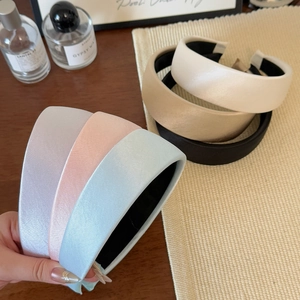 Elegant wide satin headbands for women in assorted pastel colors and silk finish