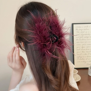 Elegant burgundy ostrich feather hair claw clip for voluminous updo hairstyles