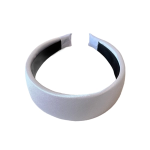 Elegant light blue padded satin headband with a smooth silk finish and non-slip lining