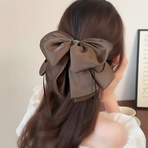 Elegant oversized brown satin bow hair clip with crystal rhinestones for women