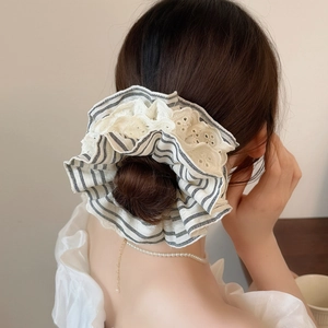 Chic four-layer lace striped scrunchie for ballet style buns on female hair