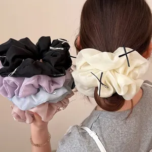 Fluffy ballet ribbon bow scrunchies set in pastel colors for sweet hair styling