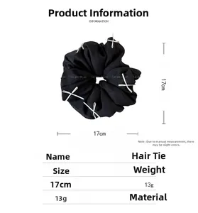 Detail view of 17cm black mesh scrunchie with white bows and product specifications