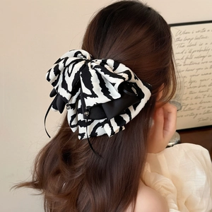 Elegant zebra striped black and white ribbon bow hair claw clip for women's hairstyles