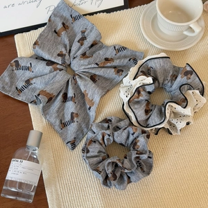 Three-piece hair accessory set with cute puppy print and grey ruffled fabric details