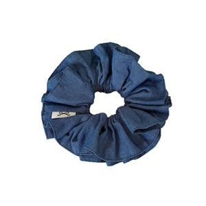 Dark blue denim scrunchie with vintage pleated texture and brand woven label for women