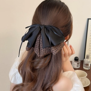 Large floral bow hair claw clip with black ribbon and leopard print for ponytail styles