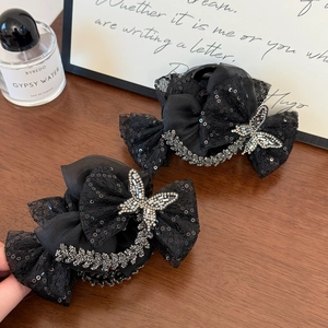 Grandes pinces à cheveux élégantes en résille noire avec paillettes et papillon