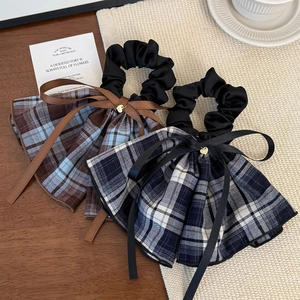 Elegant plaid bow scrunchies with ribbons and gold heart charms in two color patterns