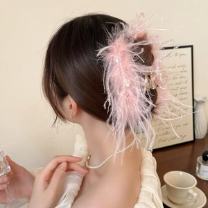 Pink ostrich feather hair claw clip with rhinestones for elegant styling and thick hair look