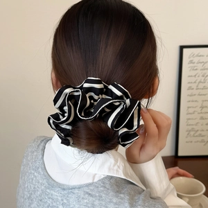 Classic black and white striped double-layered fabric scrunchie for messy bun styling