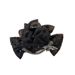 Grande pince à cheveux noire élégante avec nœud en dentelle, paillettes et strass brillants