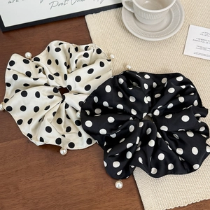 Polka dot satin scrunchies with pearl tassels in black and beige color options