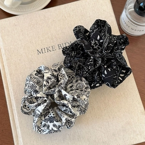 Set of two black and white paisley print scrunchies in high-quality fabric for women