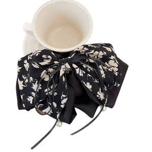 Pince à cheveux vintage avec nœud floral noir, rubans en mousseline et perles