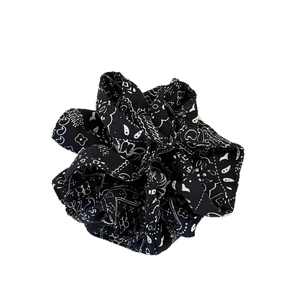 Classic black and white paisley print fabric scrunchie with layered bud floral design
