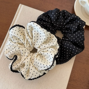 French style black and white polka dot scrunchie set with elegant ruffled edges