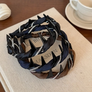 Three-piece set of twisted satin crystal headbands in black, navy blue, and brown colors