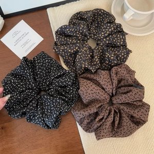 French vintage polka dot scrunchies set in leopard and classic prints for ponytails