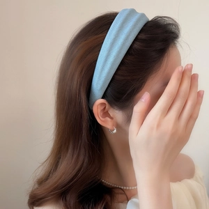 Retro denim blue wide fabric headband with textured finish for elegant hair styling