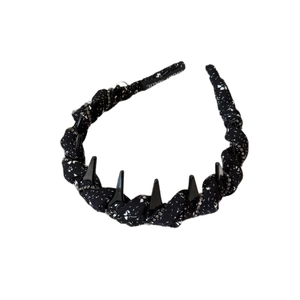 French style polka dot headband with black spikes and rhinestone chains on white background
