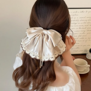 Elegant cream satin bow hair claw with lace trim and rhinestones for women ponytail