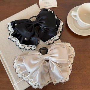Elegant satin bow hair claw with lace trim and rhinestones in black and champagne color