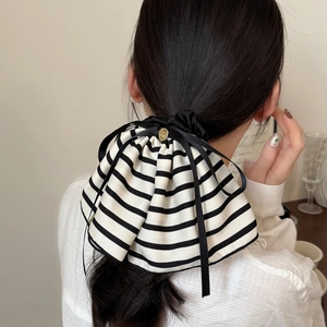 French style striped bow scrunchie with gold tag accessory for elegant ponytails