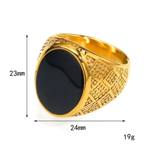 Men's gold stainless steel ring with oval black onyx gemstone and geometric texture