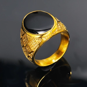 Men's gold-plated stainless steel ring featuring a large oval black gemstone with vintage relief