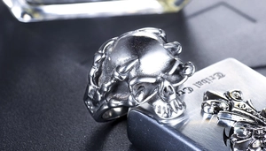 Macro shot of punk style steel skull ring featuring detailed vintage oxidation finish