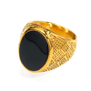 Vintage men's gold titanium ring with oval black onyx and embossed dotted texture